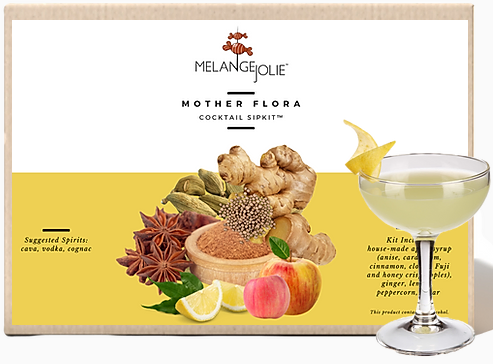 Mélange Jolie Mother Flora Cocktail SipKit™ with ingredients and glass, showcasing aromatic spices and dehydrated fruits.